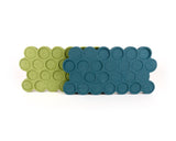 26 bright-green foam stem collars in mold, on top of 26 teal foam stem collars in mold.